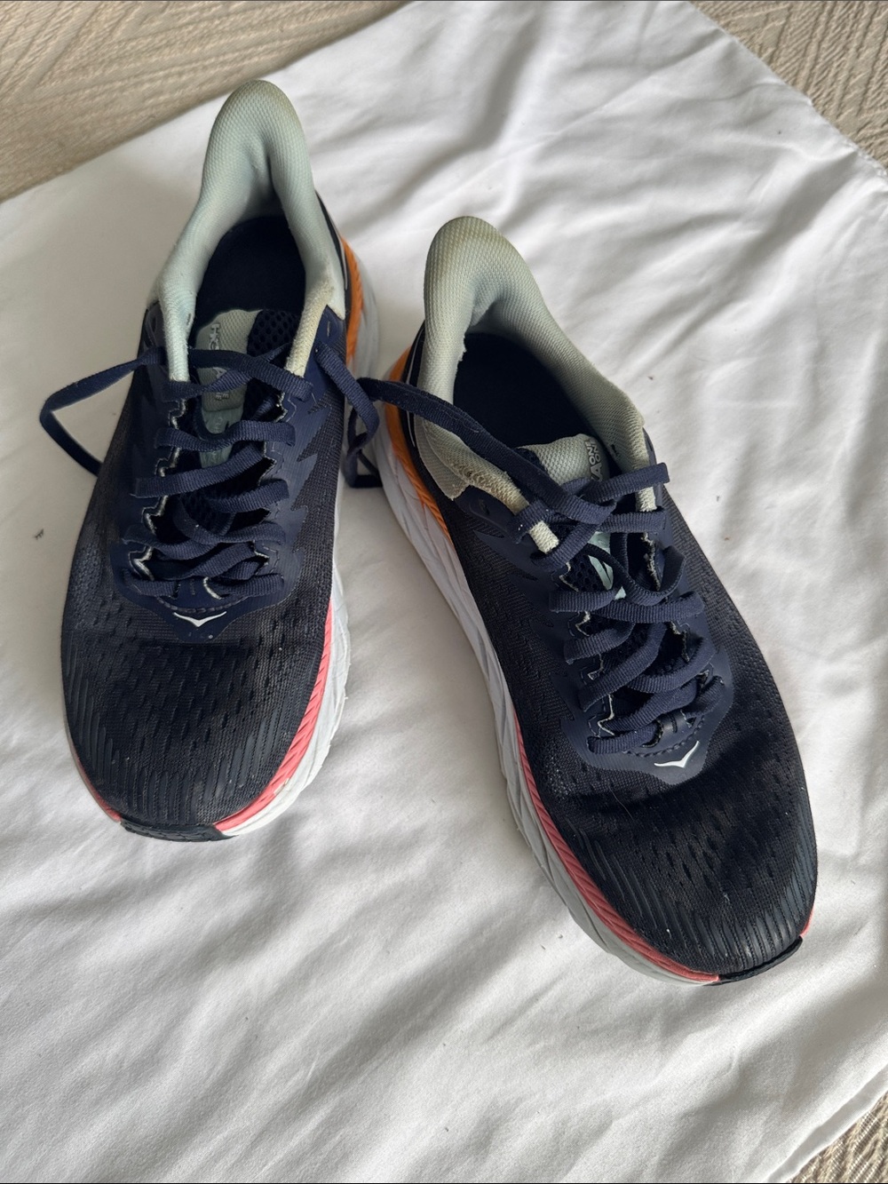 Hoka women’s Running Shoes in Navy, Light Gray and Coral